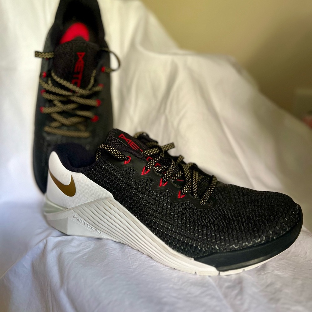 Nike  Metcon Black and Gold Athletic Shoes